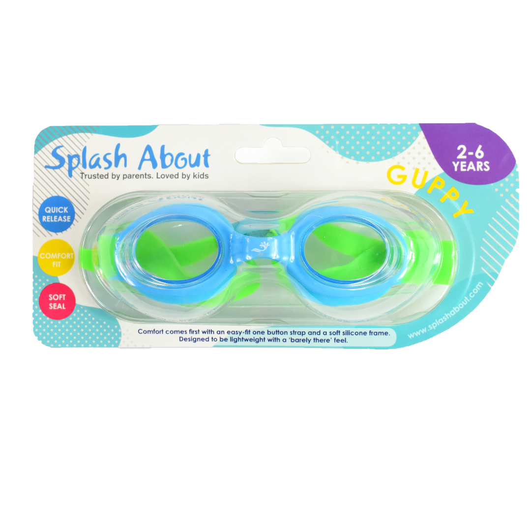 Blue and green kids goggles with clear lenses, with packaging.