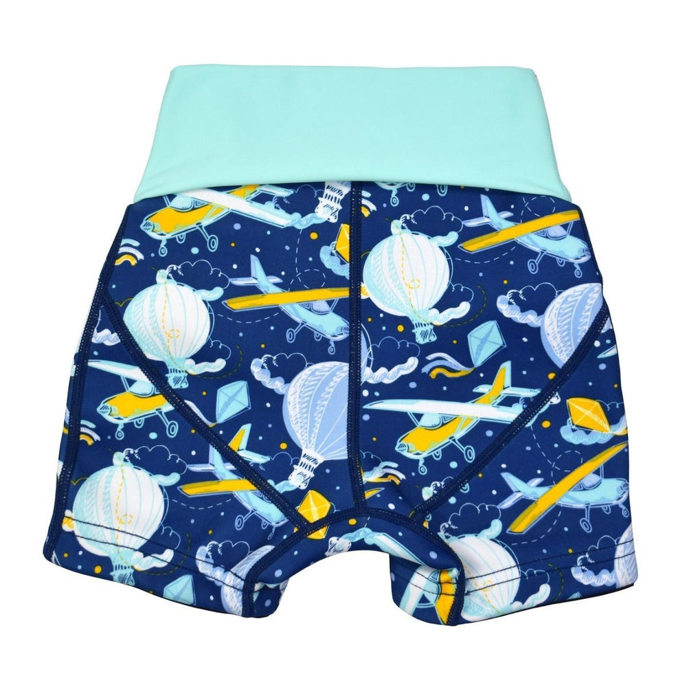 Neoprene swim shorts in navy blue with light green waist and hot air balloons themed print, including airplanes, kites and clouds. Back.