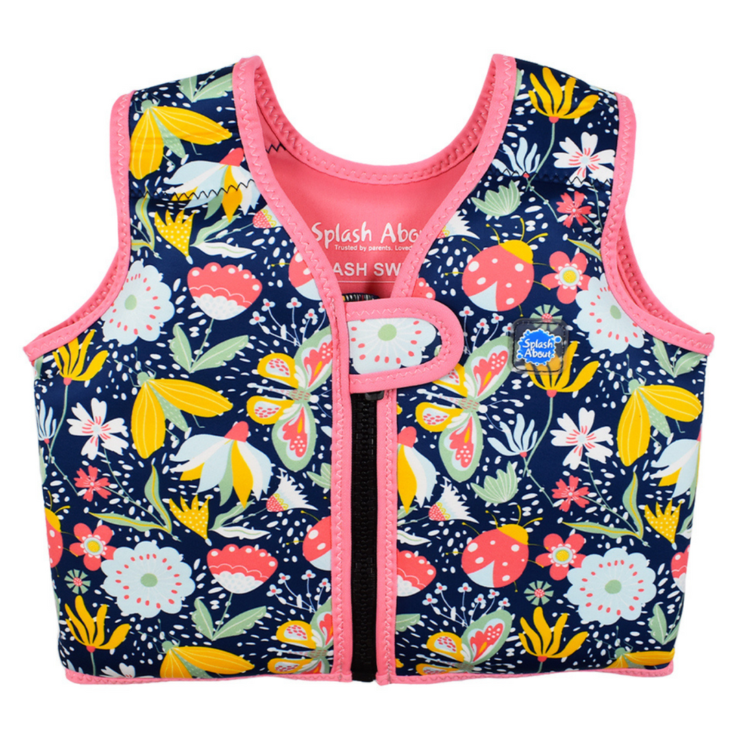 Neoprene swim vest for toddlers with non-removable floats in navy blue, pink trims and floral print. Front.