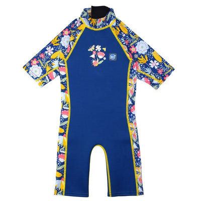 One piece UV sun and sea wetsuit for toddlers in navy blue with yellow trims. Flowers and insects themed print on sleeves, side panels, neck and chest. Front.