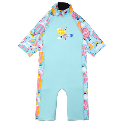 One piece UV sun and sea wetsuit for toddlers in light blue. Hot air balloons themed print including clouds and rainbows on sleeves, side panels, neck and chest. Front.