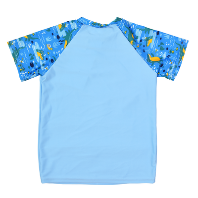 UV protective short sleeve rash top in light blue, and crocodile swamp themed print on the chest and sleeves, including crocodiles, frogs, fireflies and more. Back.