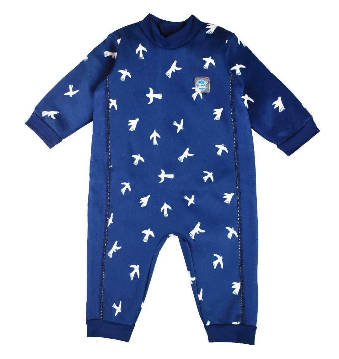 Fleece-lined baby wetsuit in navy blue and minimalist white doves print. Front.