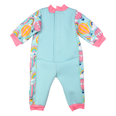 Fleece-lined baby wetsuit in baby blue with pink trims and hot air balloons themed print, including rainbows and clouds. Back.